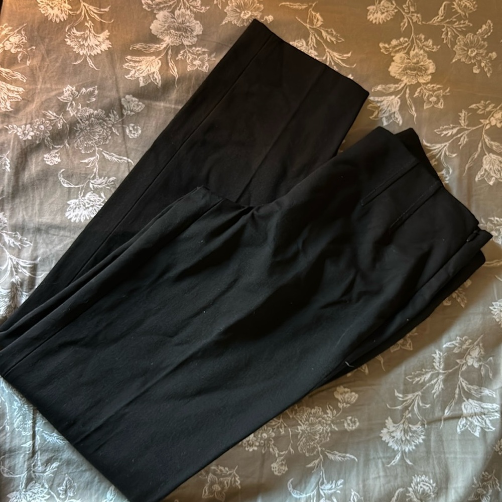 Structured slim, straight legged slacks with side zipper.